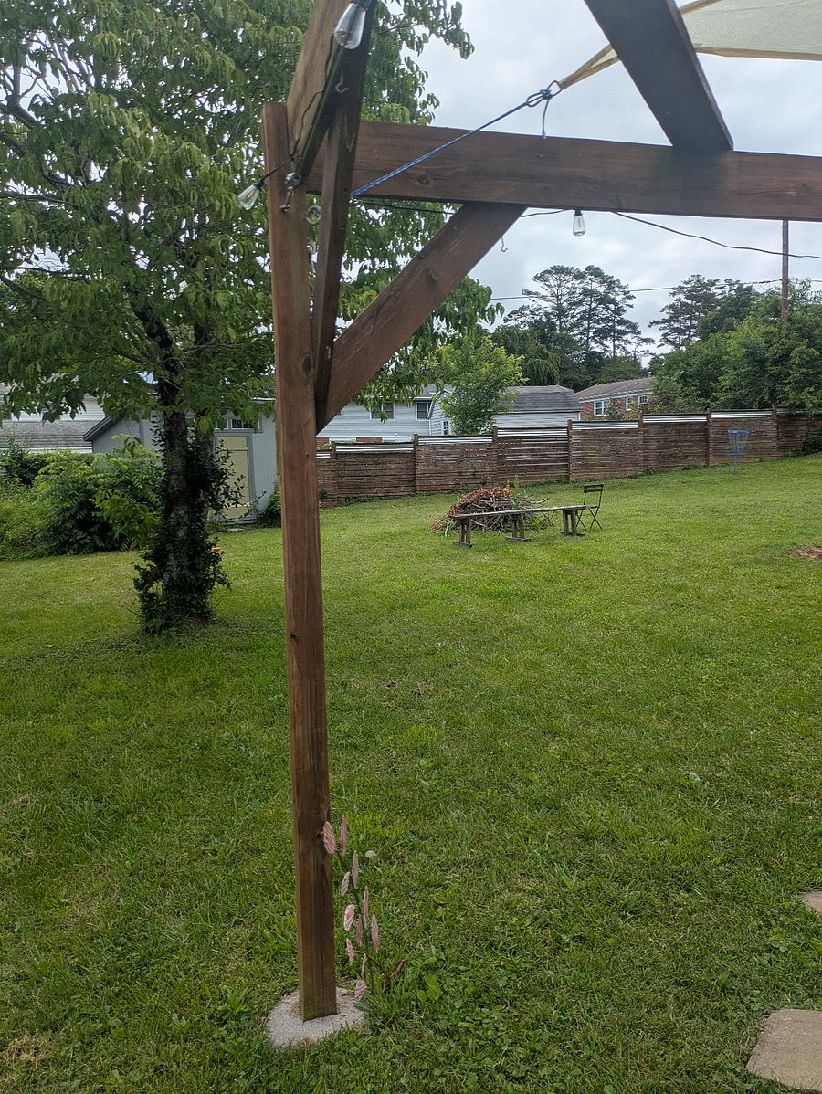 View of back yard from entrance of apartment