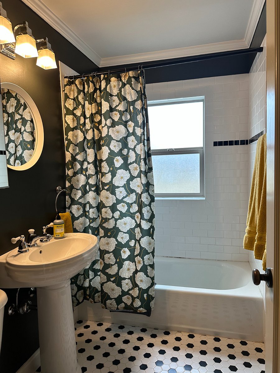 Updated bathroom with tub and shower