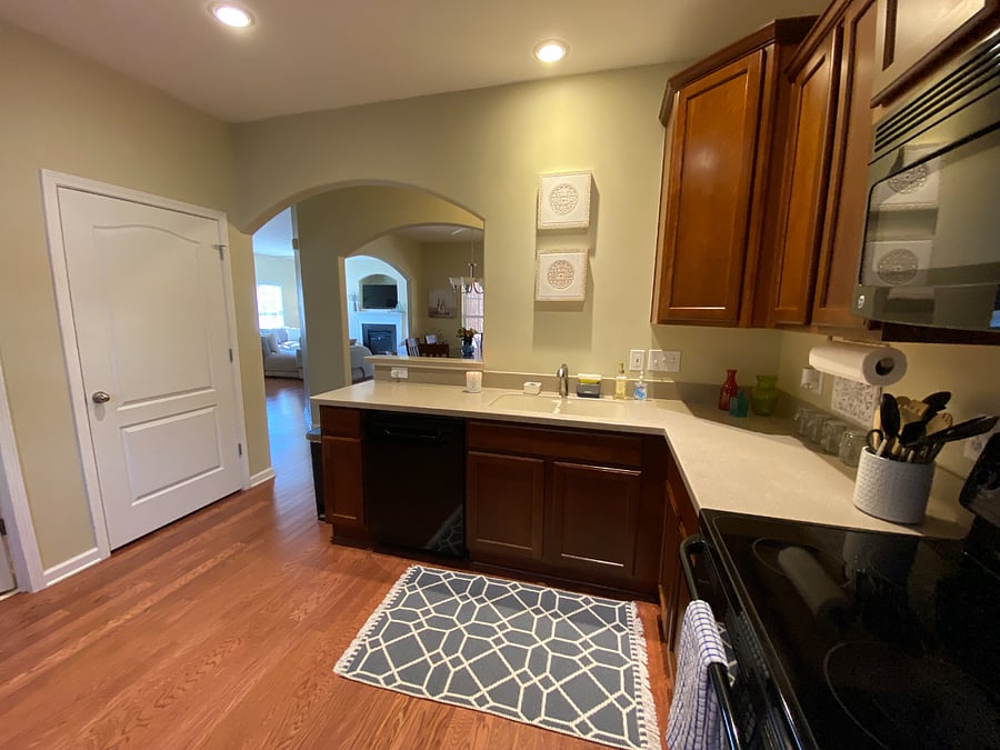 Yes, you can see the TV while you cook dinner