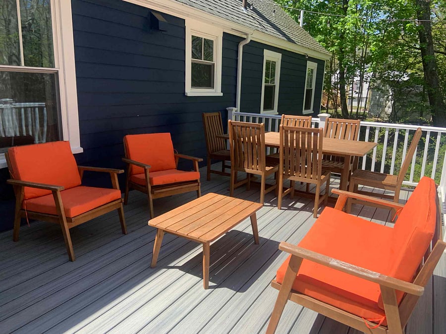 Spacious back deck overlooking peaceful wetlands, where you'll see ducks floating by and hear birds singing. Please be mindful the wetlands water goes up and down through the season. The back yard is not fenced in.