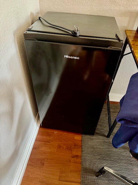 Mini refrigerator at working area