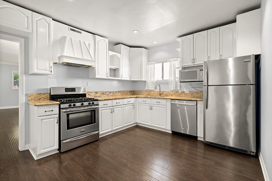 Kitchen with stainless steel appliances, refrigerator, dishwasher, stove, microwave
