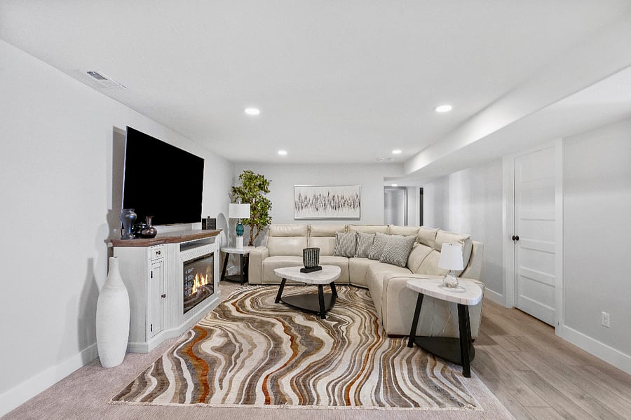 Basement Family Room:
-Large Double Reclining Leather Sectional
-Office Workstation/Printer
-Gas Fireplace
