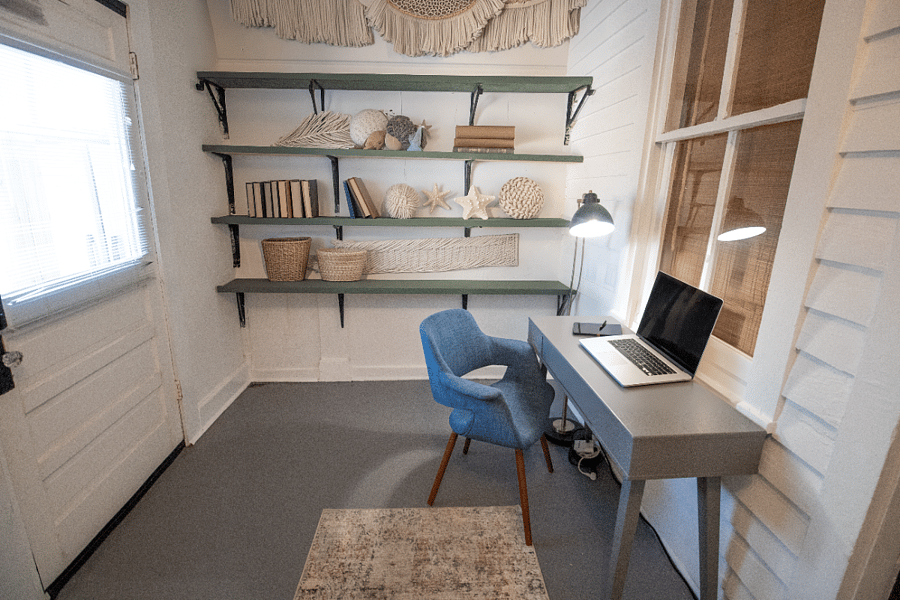Virtually staged with light wood tones, woven accents, soft books, and breezy decor. The space feels airy, calm, and effortlessly inspiring like studying by the coast.