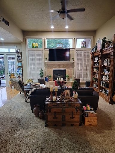 Shared Living Room with Fireplace and 55 inch Smart TV.