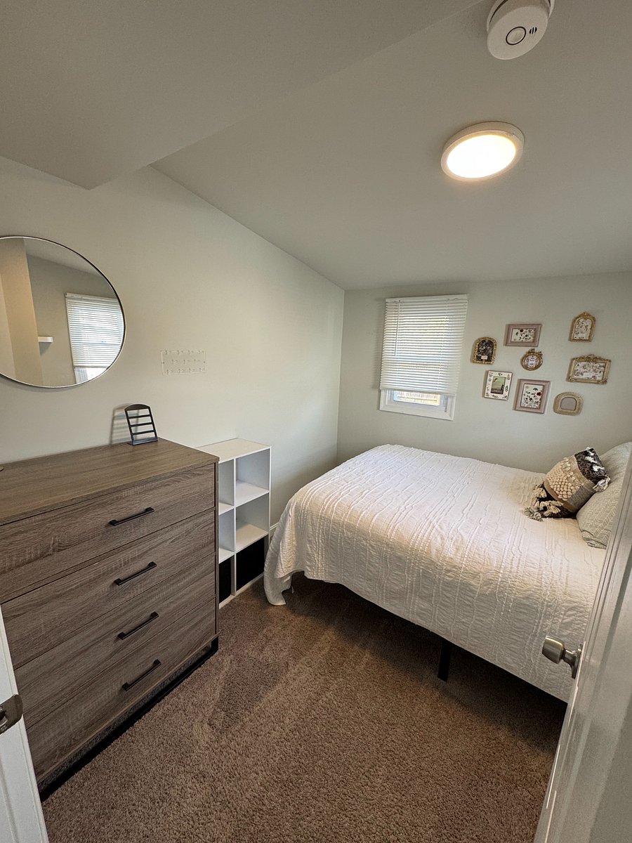Bedroom with queen mattress