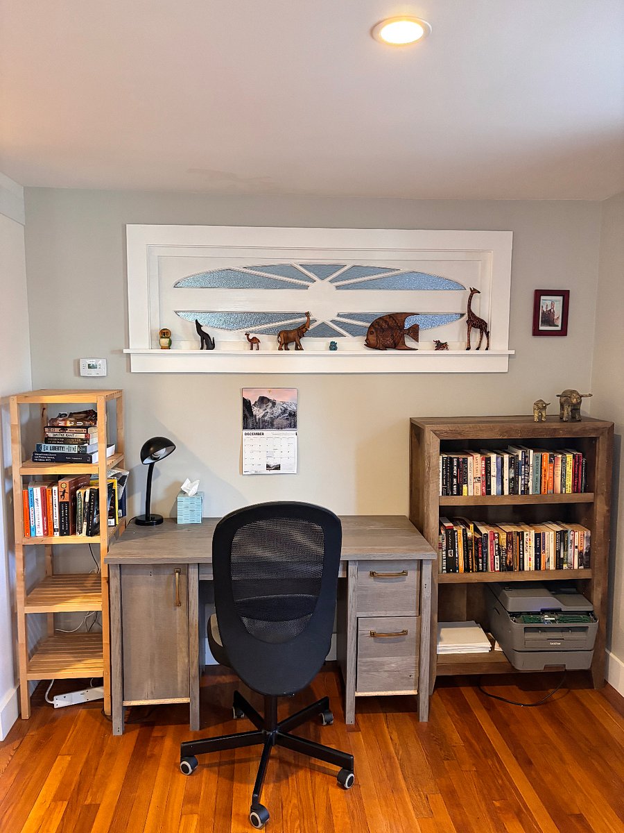 Dedicated workspace with large desk.