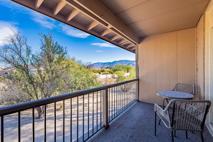 Balcony patio with mountain views.