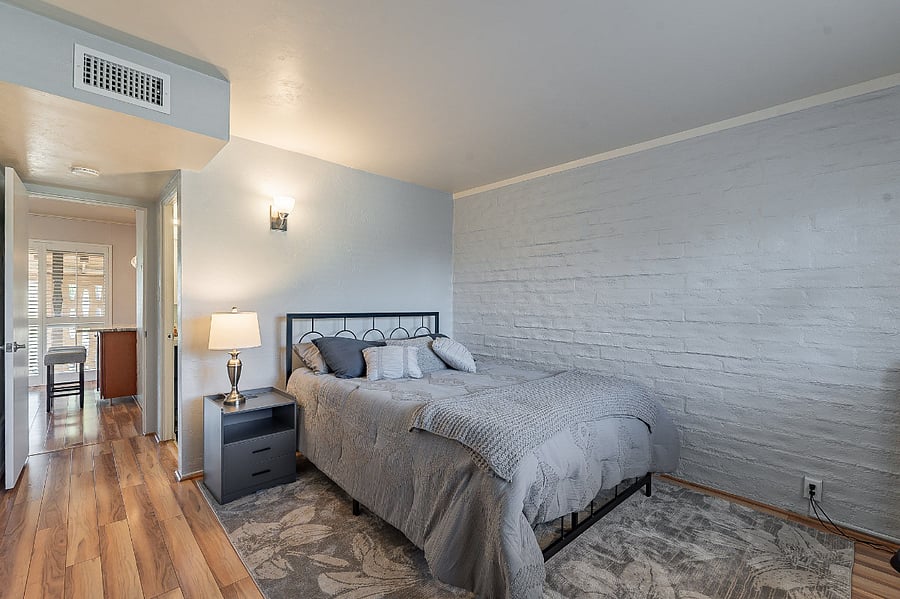 Bedroom with queen size bed.