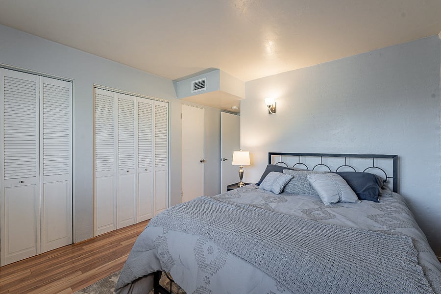 Bed with comfortable linens.