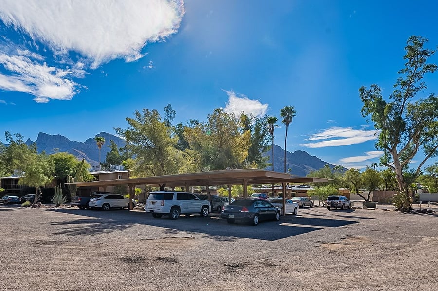 View of covered parking area. The unit includes a reserved covered parking spot.