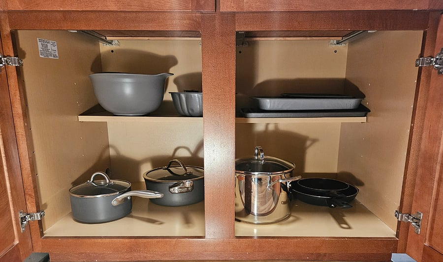 Complete cookware and food preparation needs provided.