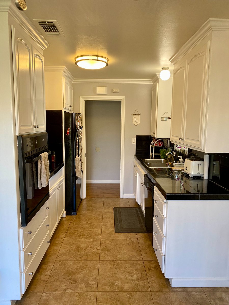 Kitchen: tenant cabinet shelves and refrigerator space are labeled