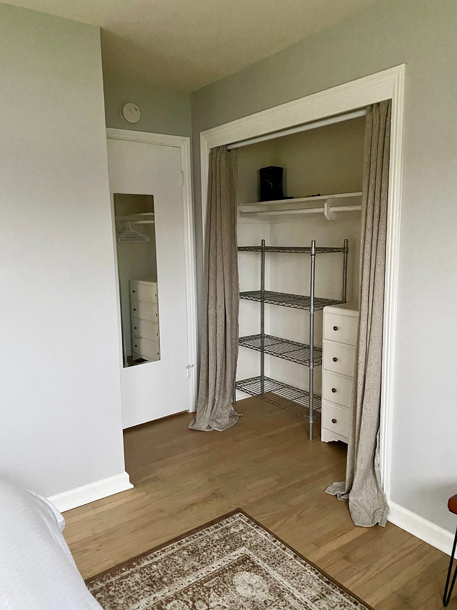 Tenant room: closet with hangers included for use. There is a small dresser and a small space heater if needed. The storage shelf can stay or be removed depending on tenant wishes. Full sized mirror on back of door.