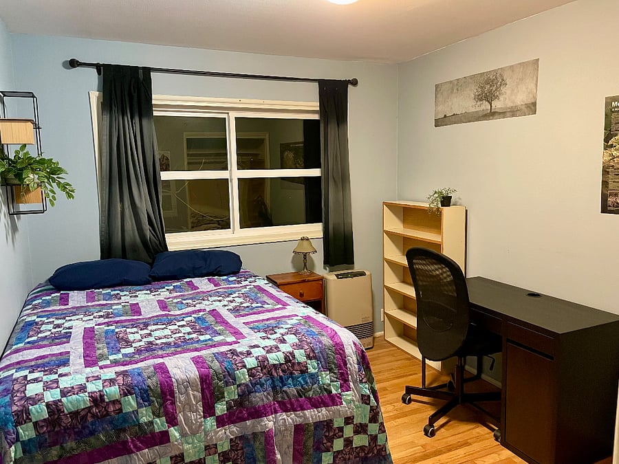 2nd bedroom with a comfy full size bed, with a desk and chair for work space