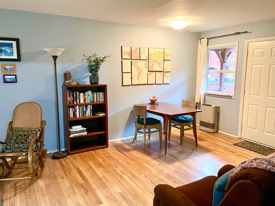 Dining area and back door. The condo has wood floors throughout.