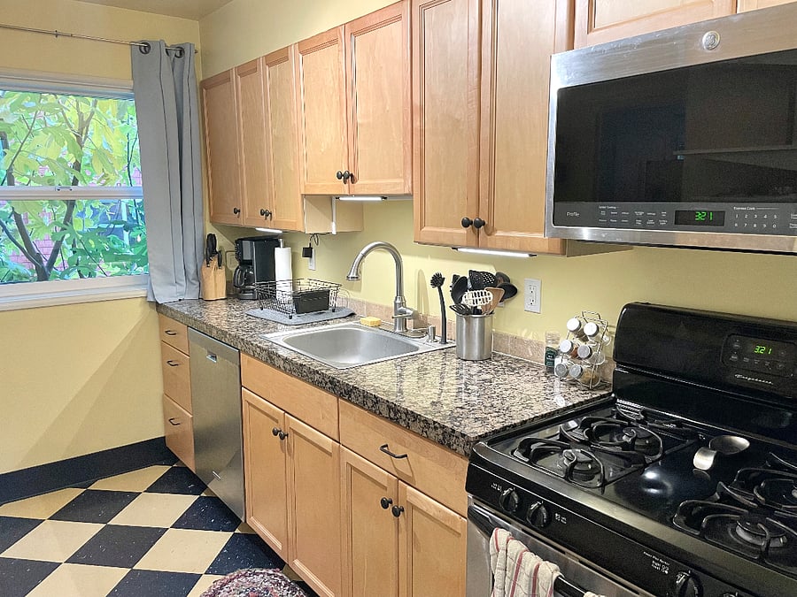 The kitchen has a gas stove and oven, dishwasher, microwave, disposal, toaster oven, and drip coffee maker. The cupboards are very well stocked with lots of cooking and baking essentials.
