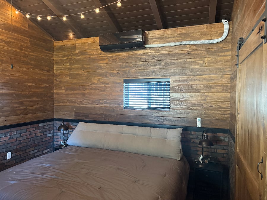 Two night stands with phone chargers. 