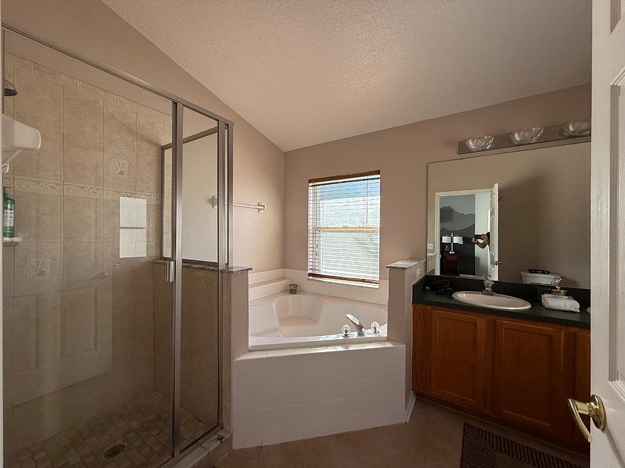 Master bath with Roman tub and shower. Double vanity.