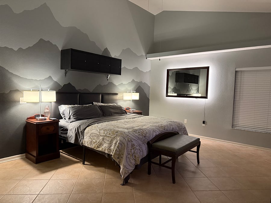 Master bedroom with mountain decor.
