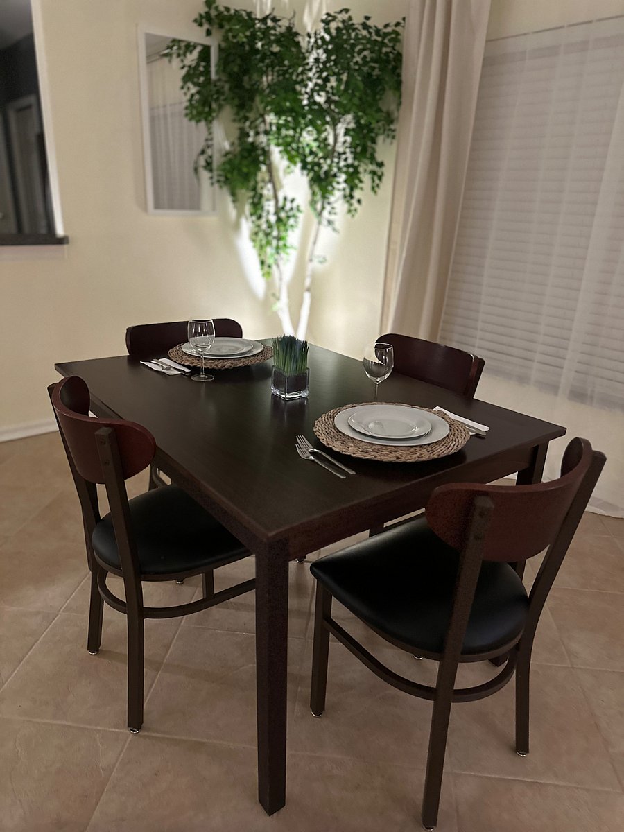 Dining table with seating for four.