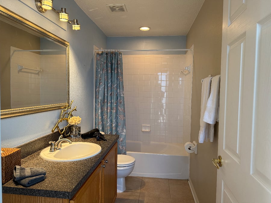 Second bathroom with tub/shower combo.