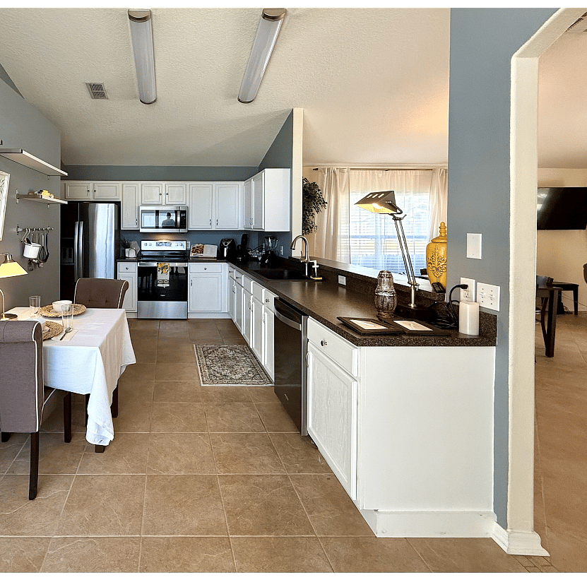 Eat-in kitchen with plenty of storage space. Great for cooks!