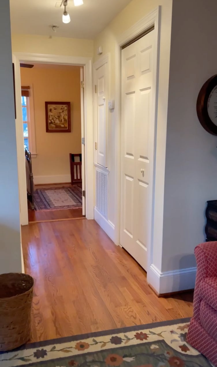 Hallway to bathroom and bedroom; full clothes closet with smaller linen closet