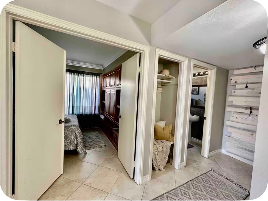 Double door downstairs bedroom #4. Next to the closet, full bathroom and laundry. 