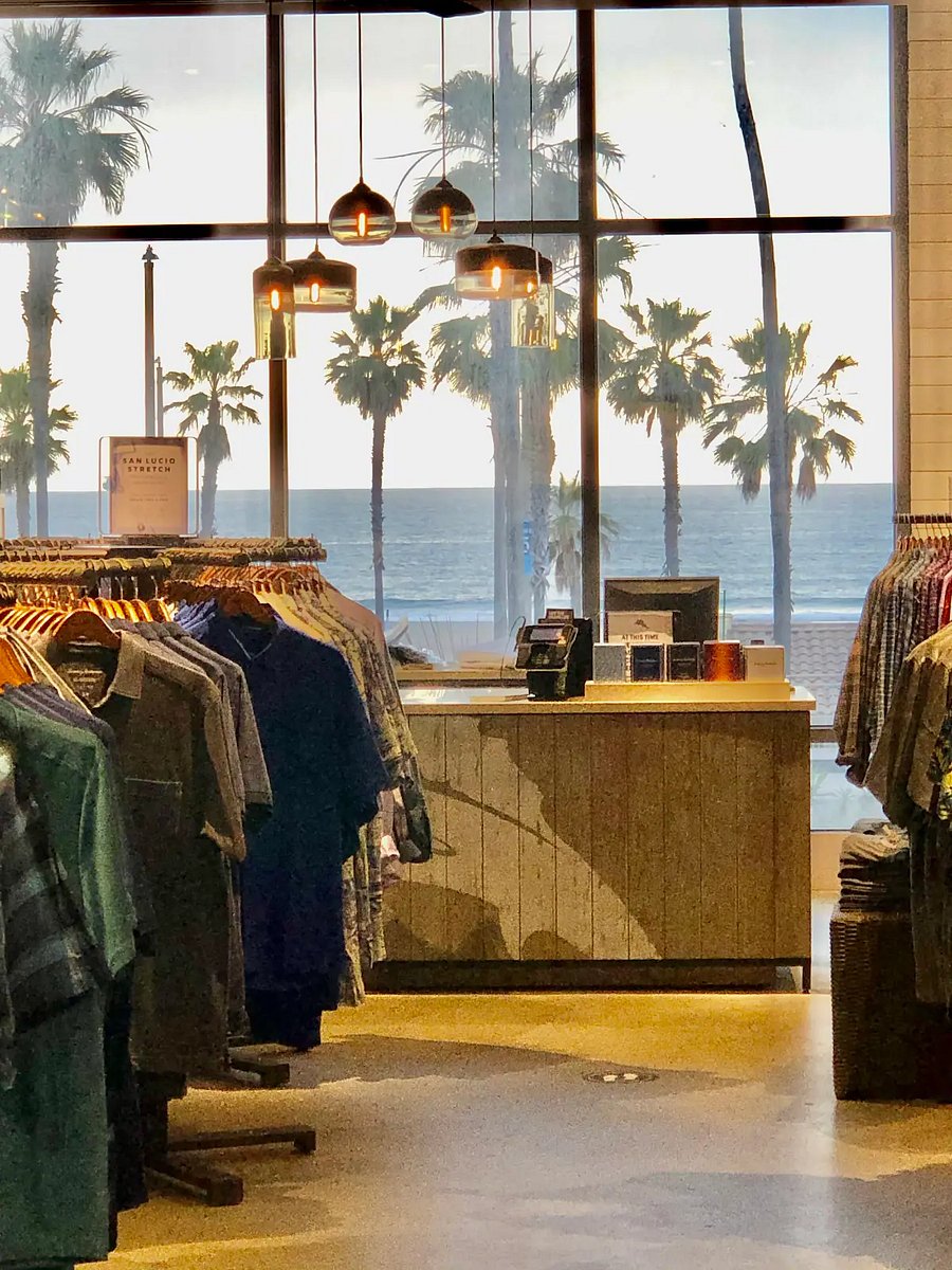Shop in trendy boutiques at Pacific City outdoor mall with views of the Pacific Ocean.

