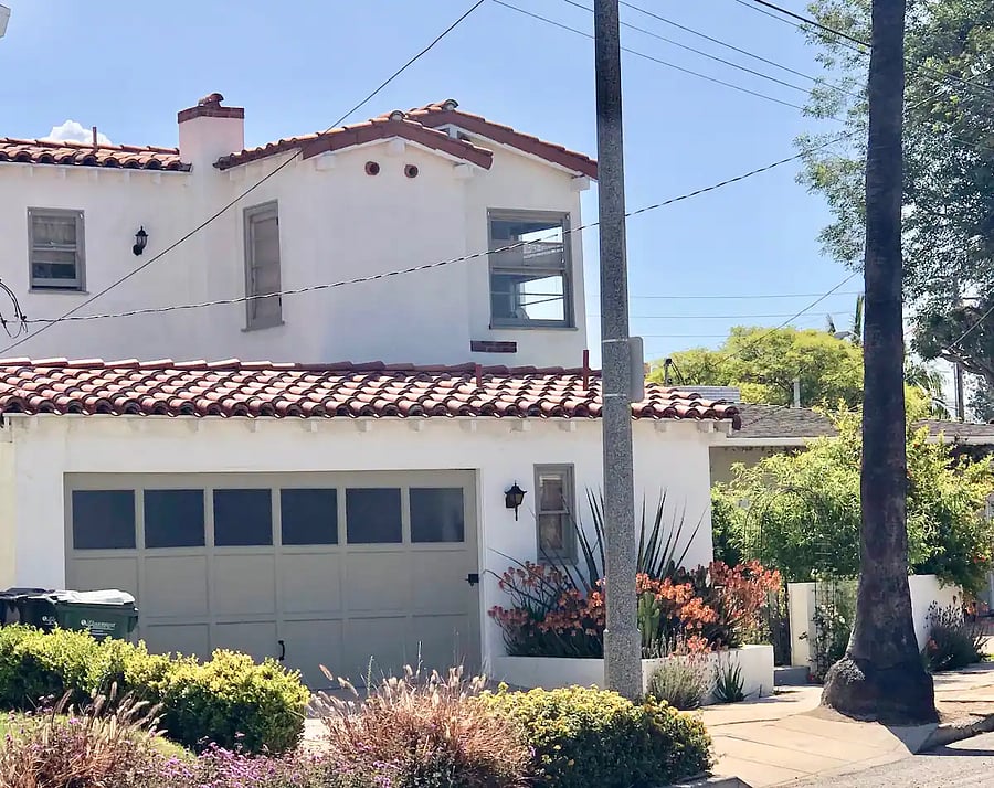 View of Upper mother in law guest quarters and garage door from Palm Ave.
