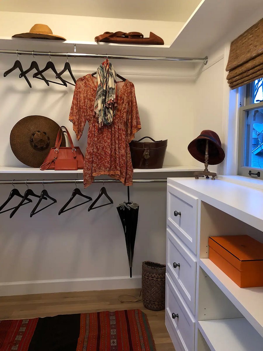 Upper mother in law guest quarters - Master suite spacious walk-in closet with natural lighting.
