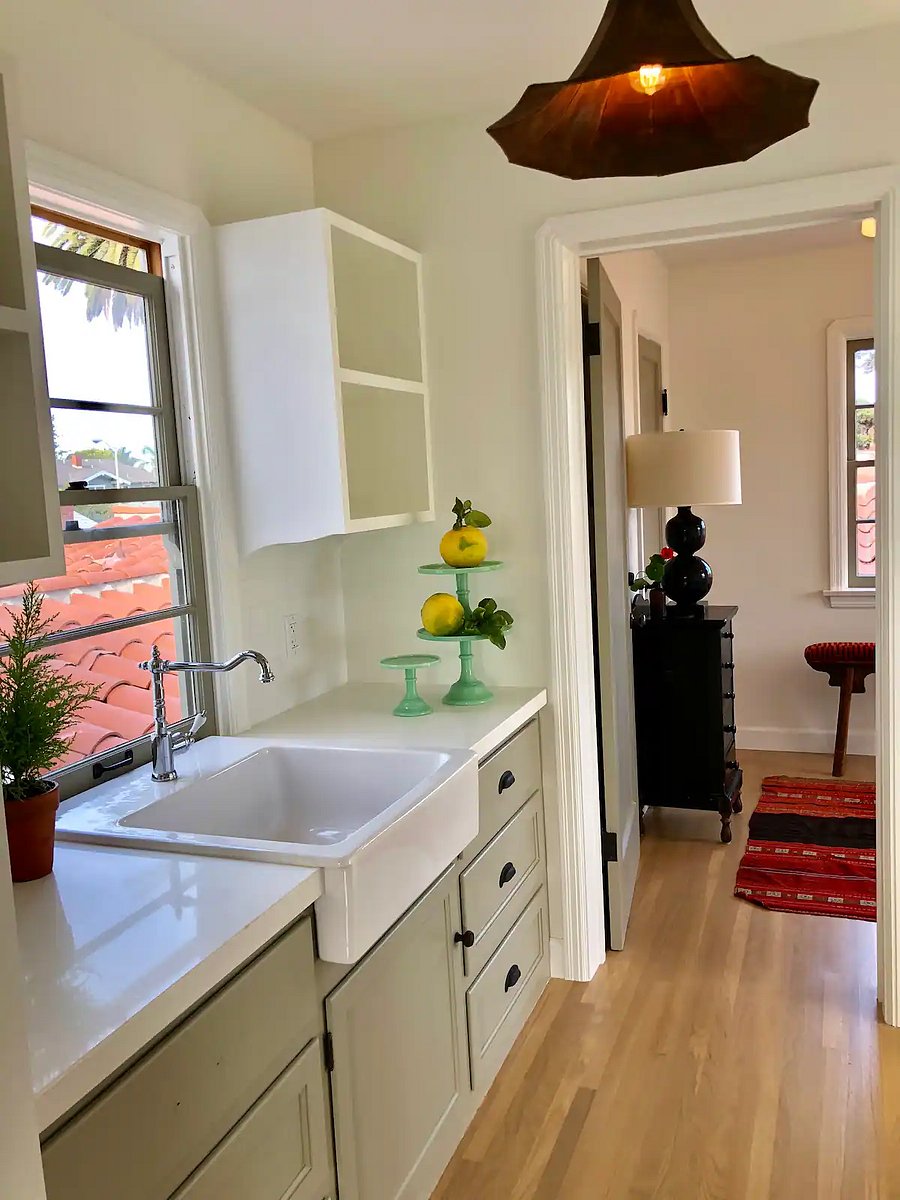Farm sink kitchenette counter at open landing to Upper mother in law guest quarters.
