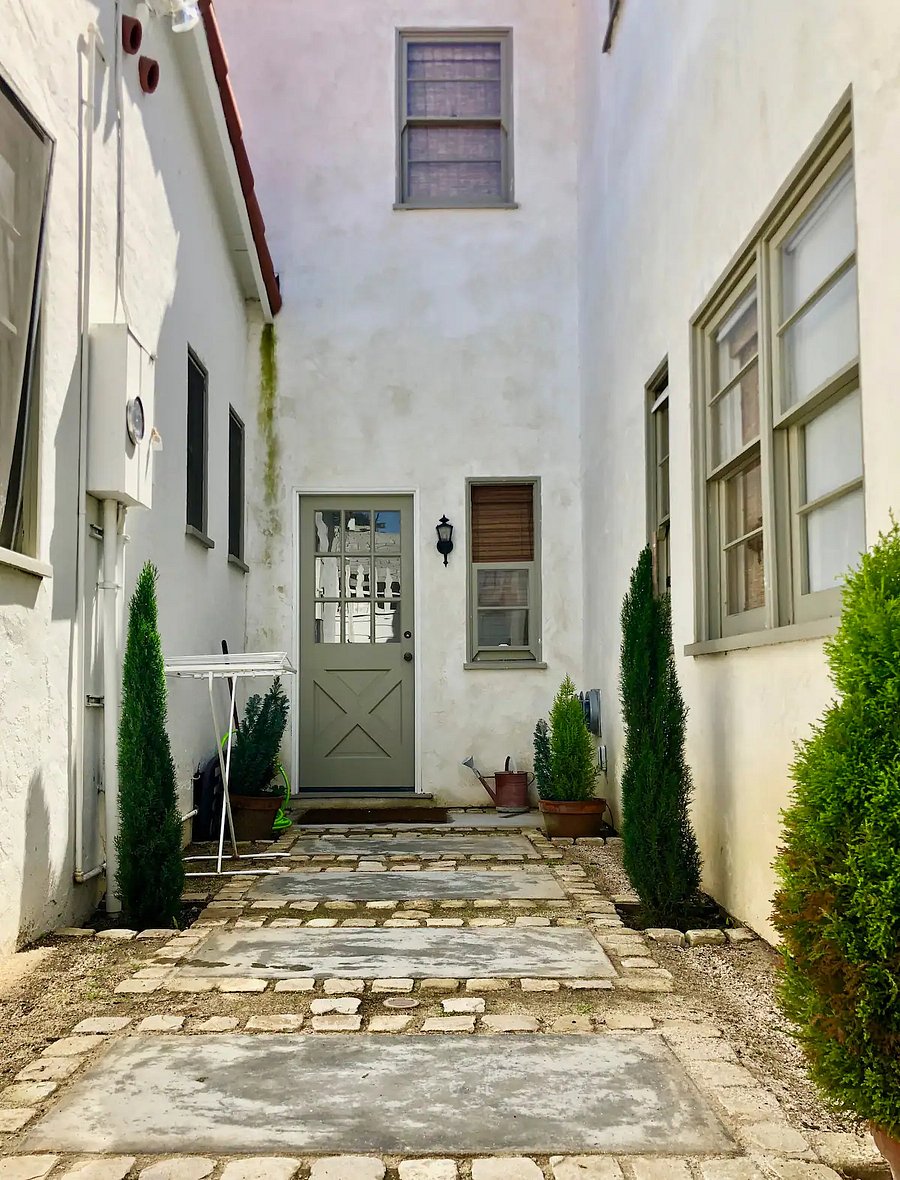 A tranquil courtyard that separates the main house from the Mother in Law Guest Quarters.