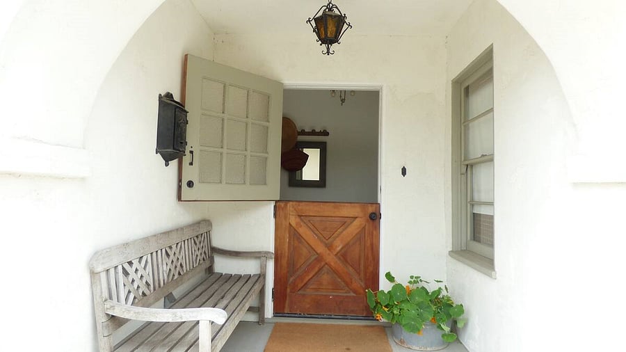 Dutch door at back porch exterior private entrance to Mother in Law guest Quarters from rear garden on Palm Ave.