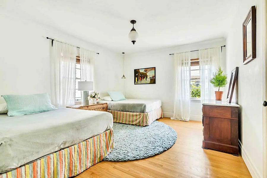 Master Bedroom suite 1 with 2 full beds, in the main house.