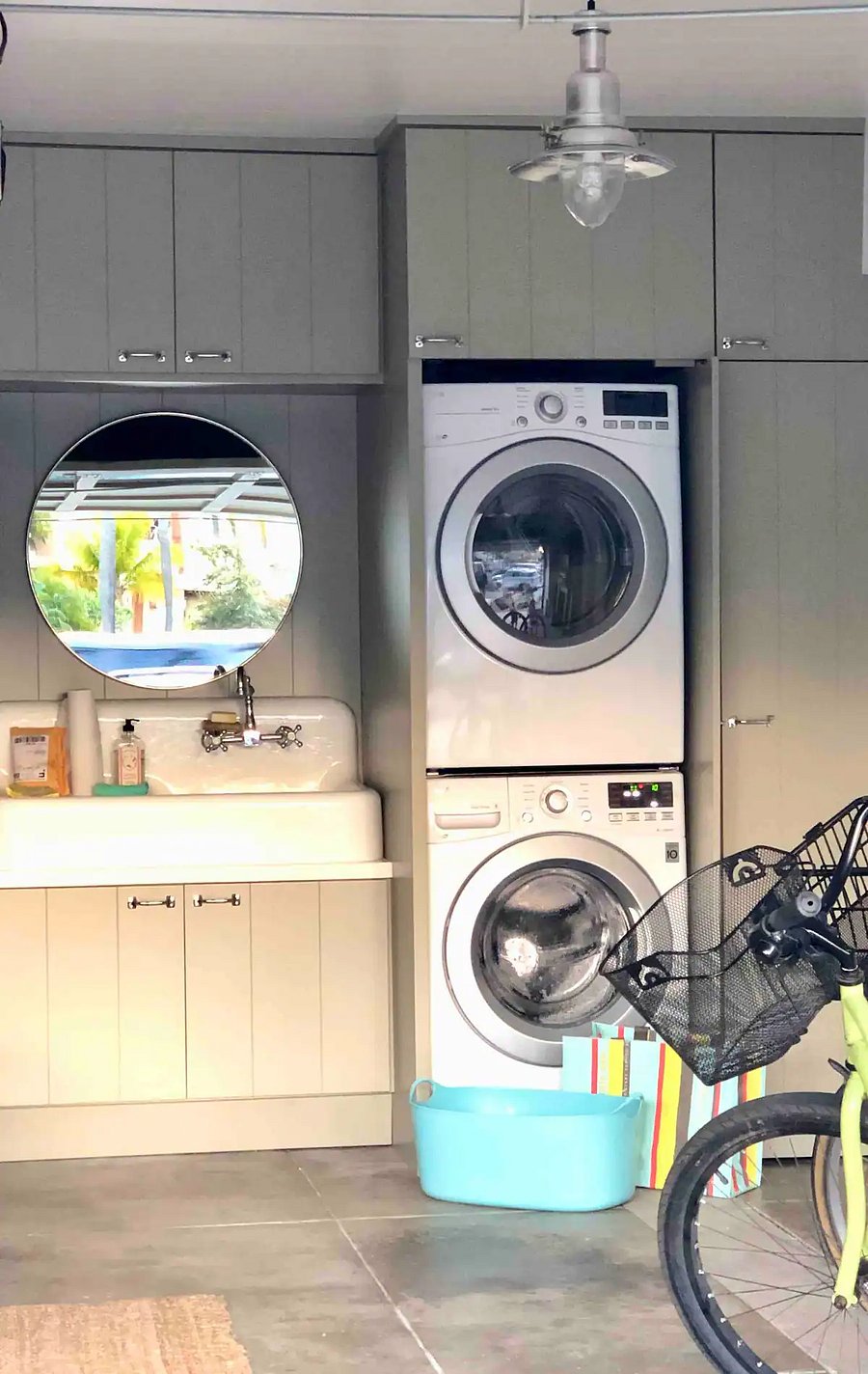 Second set of washer & dryer situated in the garage (primarily reserved to the main house) next to a large farm sink.