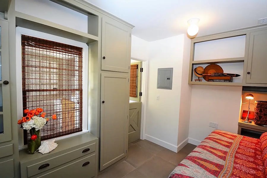 Office / Bedroom 3 showing built-in cabinets facing single day bed - in main house