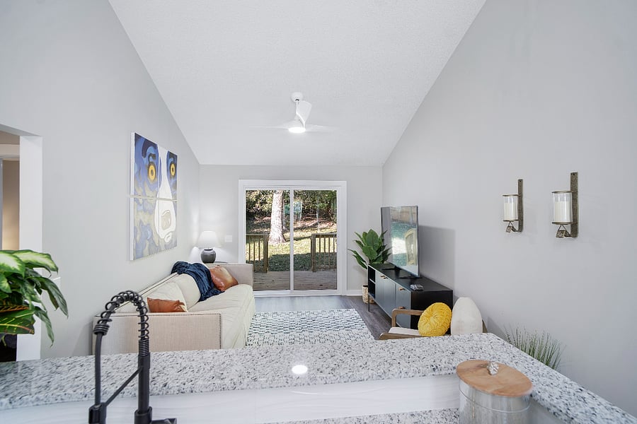 living room and fenced back yard