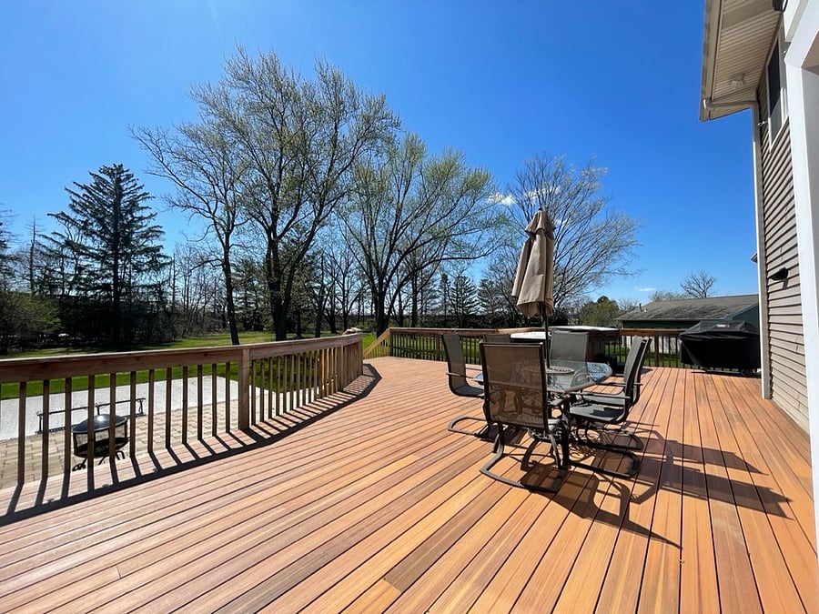 Back deck facing open backyard.