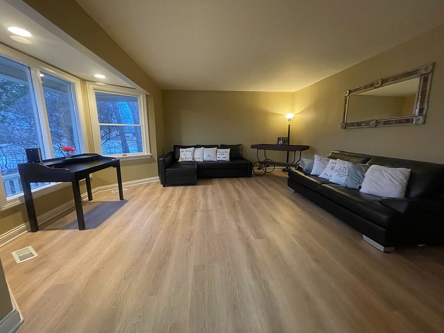 First floor living room couch pulls out and turns into a bed.