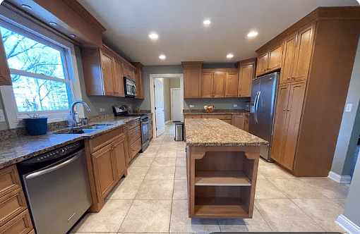 Fully stocked kitchen with island.