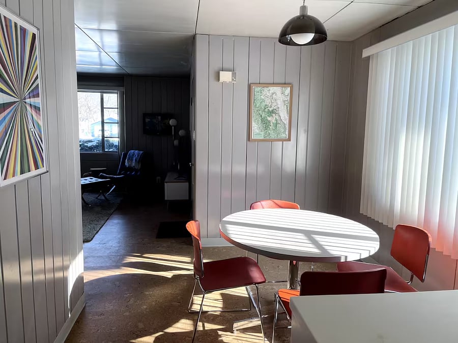 Dining area opens to kitchen and living room.