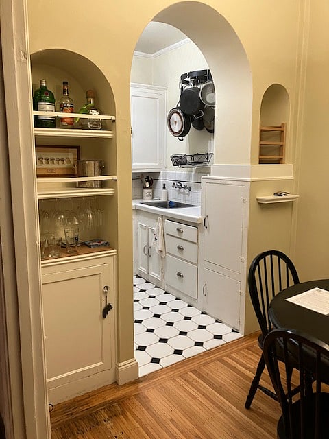 Entrance to cozy kitchen from DR