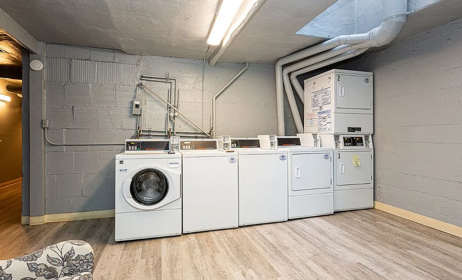 Laundry room in basement. ALSO locked bike storage in basement if needed.