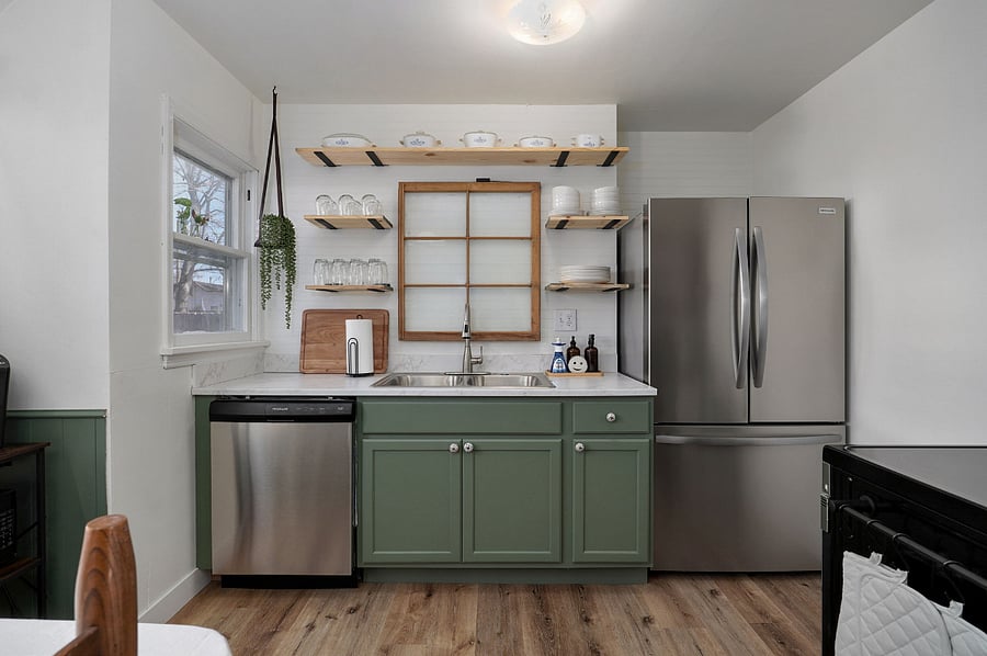 Kitchen has stainless steel appliances and comes fully stocked with everything you need to cook your favorite meals.