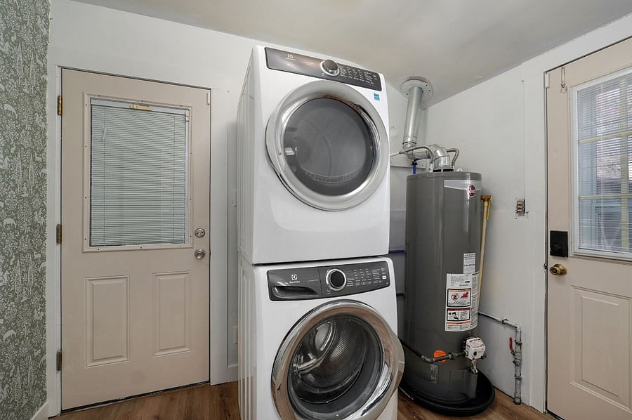 Full size washer and dryer are located right off kitchen