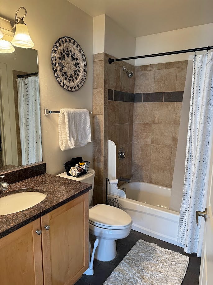 smaller bathroom opens to the second bedroom and the living room.