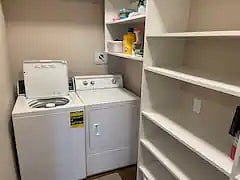 Large pantry with private laundry