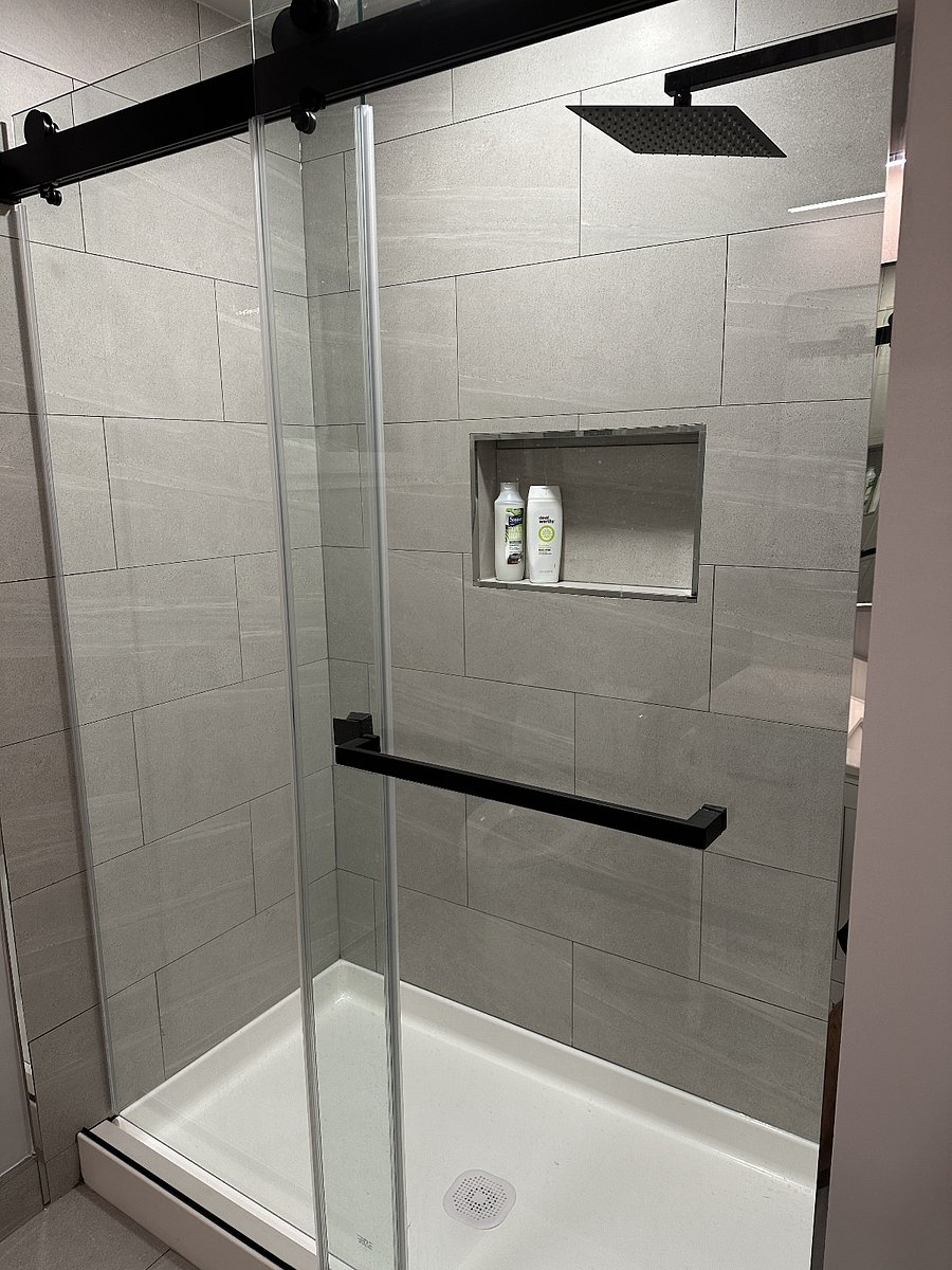 newly remodeled bathroom with standing shower